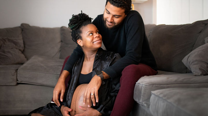 image of couple sitting together and looking lovingly at each other