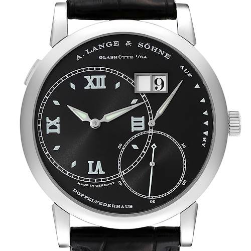 The image shows a front view of the A. Lange & Sohne Lange 1 115.028 Men's White Gold Black Dial watch, highlighting its black dial, date display, and subdials.