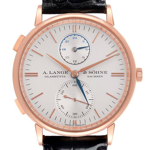 The A. Lange & Sohne Saxonia 386.032 Men's Rose Gold Silver Dial watch is shown from a top-down angle, highlighting the face, hands, and strap attachment.