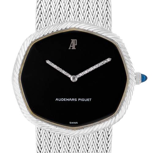 The image shows a frontal view of a vintage Audemars Piguet watch, highlighting the case, dial, strap, and crown.