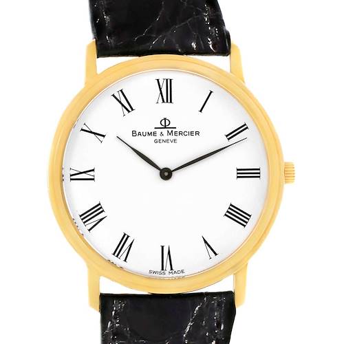 This image shows a front view of a Baume & Mercier Classima MV045088 Men's Yellow Gold White Dial MV045088 Men's Yellow Gold White Dial watch, highlighting its dial, hands, case, and a portion of the strap.