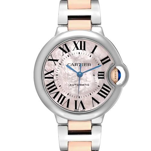 The Cartier Ballon Bleu W6920070 Women's Steel and Gold (two tone) Mother of Pearl Dial watch is shown from the front, displaying the face, hands, Roman numerals, and crown with a blue cabochon.
