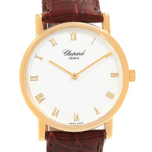 The image shows a frontal view of the Chopard Classique 16/3154 Men's Yellow Gold White Dial 16/3154 Men's Yellow Gold White Dial watch, featuring its dial, hands, leather strap, and crown.