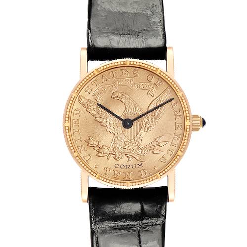 The Corum Coin Watch Men's Yellow Gold Champagne Dial Men's Yellow Gold Champagne Dial is shown from a front view, featuring the engraved dial and black leather strap.