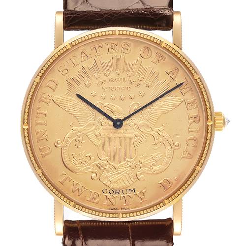 The Corum Coin Watch 4414556 Men's Yellow Gold Champagne Dial 4414556 Men's Yellow Gold Champagne Dial is shown head-on, displaying the face with an intricate eagle design and gold casing.