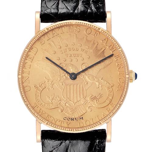 The Corum Coin Watch 4414556 Men's Yellow Gold Champagne Dial 4414556 Men's Yellow Gold Champagne Dial is shown from the front, featuring the detailed face, black strap, and crown on the right.