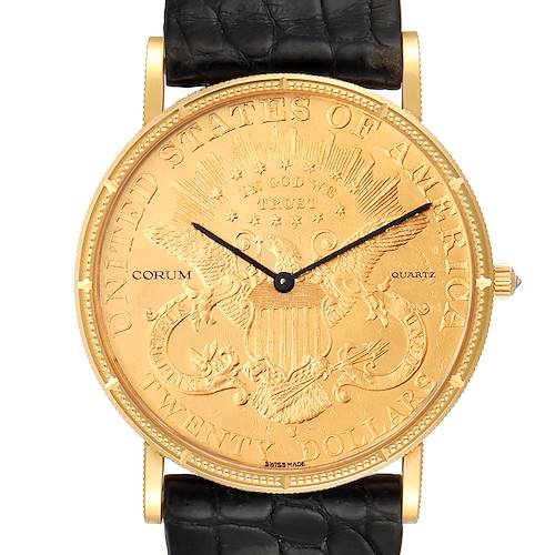 The image shows a frontal view of the Corum Coin Watch  Men's Yellow Gold Black Dial  Men's Yellow Gold Black Dial model, highlighting its gold coin dial and black leather strap.