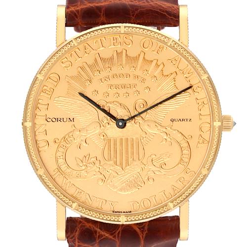 This image shows the front view of the Corum Coin Watch 4708590 Men's Yellow Gold Champagne Dial 4708590 Men's Yellow Gold Champagne Dial model, featuring detailed engravings and a leather strap.
