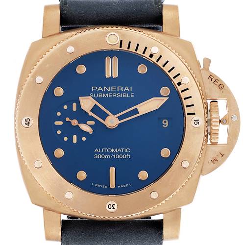 The Panerai Submersible PAM01074 Men's Bronze Blue Dial PAM01074 Men's Bronze Blue Dial watch is shown from the front, highlighting the blue dial, bezel, and crown guard.