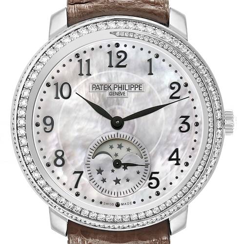 The Patek Philippe Complications 4968G-010 Women's White Gold Mother of Pearl Dial watch is shown from a frontal view, highlighting its diamond bezel, moon phase, and brown strap.