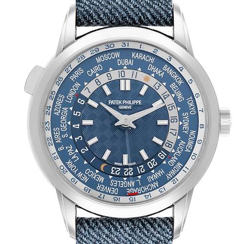 The Patek Philippe Complications 5330G Men's White Gold Blue Dial watch is shown from a front angle, highlighting the dial, hands, bezel, and world time indicators.