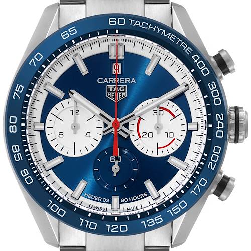 The image shows a close-up of a Tag Heuer Carrera CBN2A1E Men's Stainless Steel Blue Dial CBN2A1E Men's Stainless Steel Blue Dial watch face, emphasizing the dial, tachymeter, and chronograph subdials.