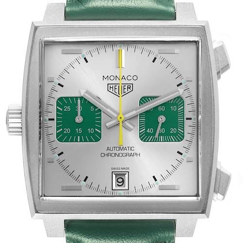 The Tag Heuer Monaco CAW218E.FC6565 Men's Titanium Silver Dial CAW218E.FC6565 Men's Titanium Silver Dial watch is shown from the front, displaying its square dial, subdials, and part of the green strap.